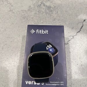 Fitbit Versa 3 - gold with blue straps